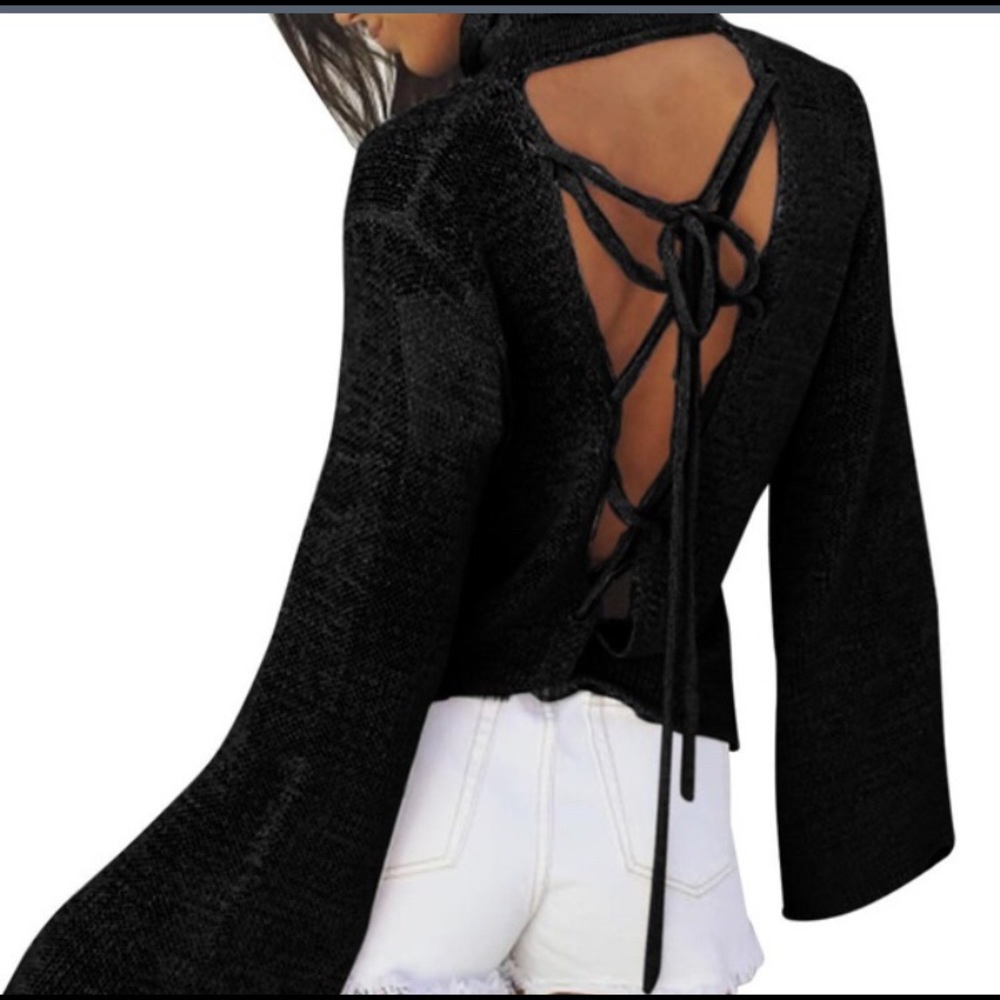 Lightweight. Blue sweater ties in Back