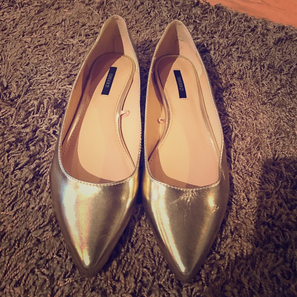 Light gold pointed flats