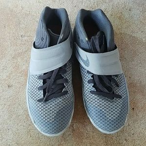 Kyrie Irving high top tennis shoes