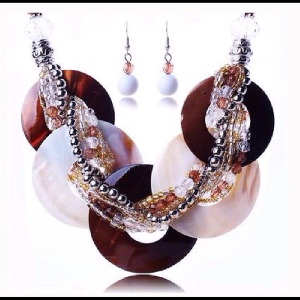 Tortoise and white shell necklace, white earrIngs.