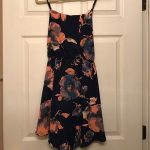 NWOT. Never worn. Floral print dress, size M
