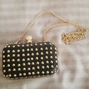 Skull studded clutch purse