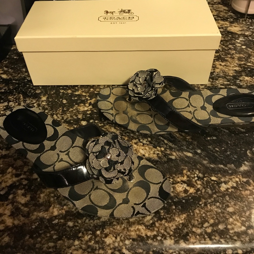 Black and white Coach sandals