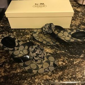 Black and white Coach sandals