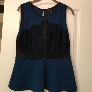 Sleeveless top with lace.