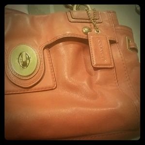 Coral colored COACH purse