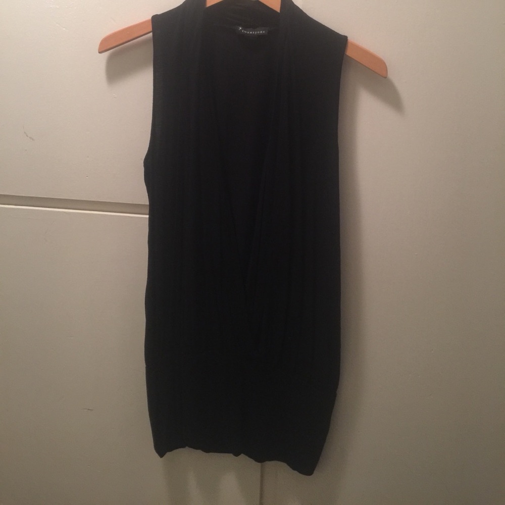 Tunic style, sleeveless top