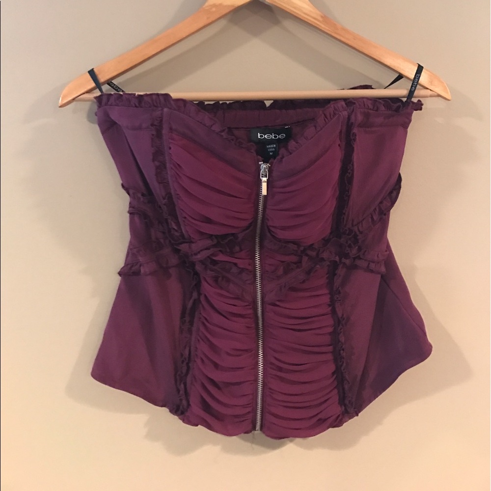 Bebe outerwear bustier with zipper front