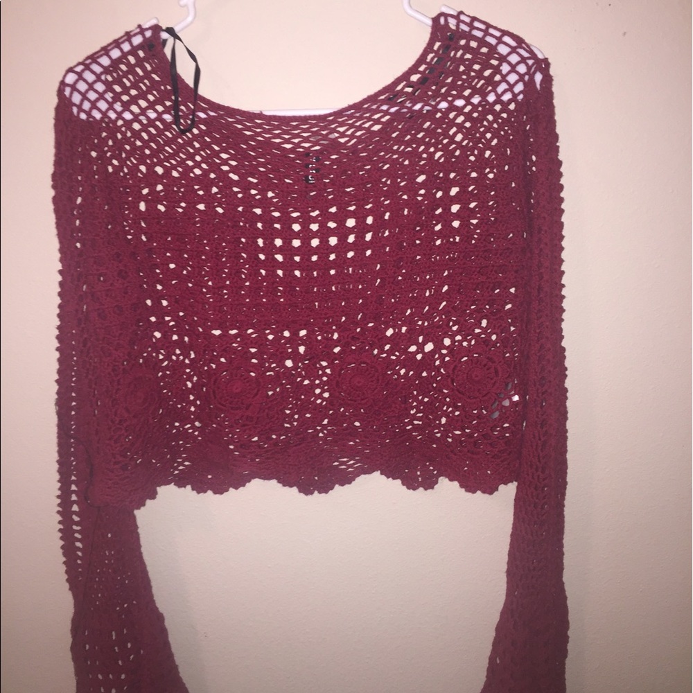 Red knit top with bell sleeves