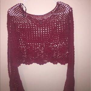 Red knit top with bell sleeves