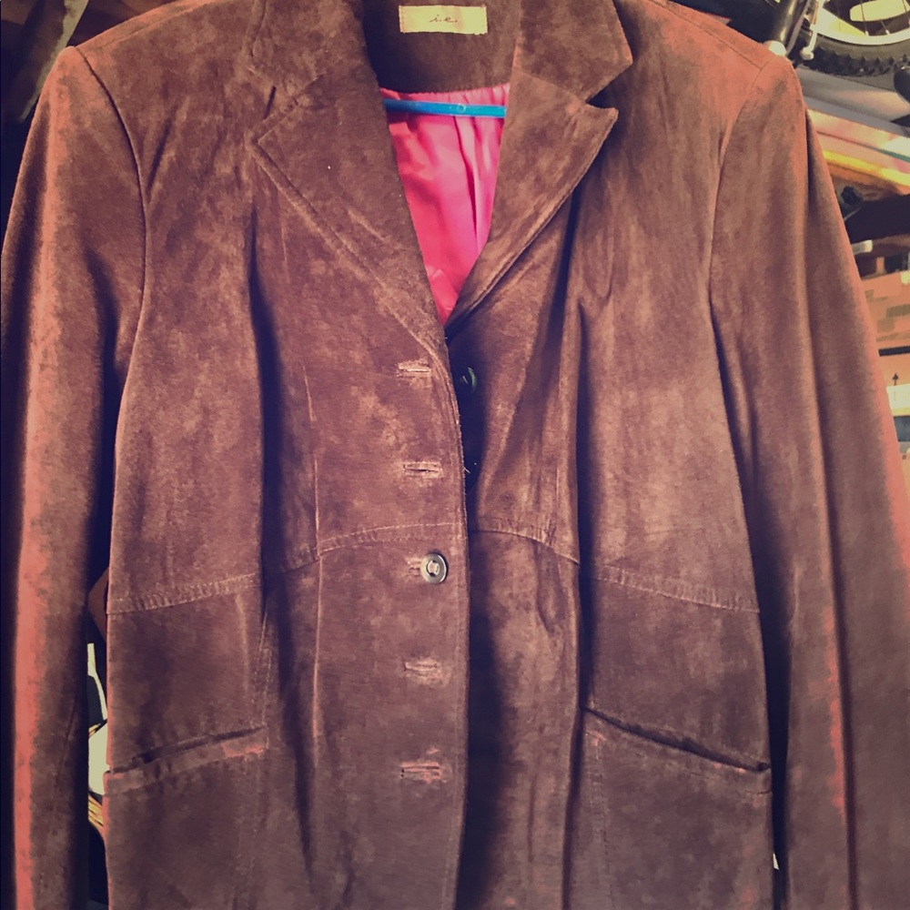 Brown leather blazer. Good condition.