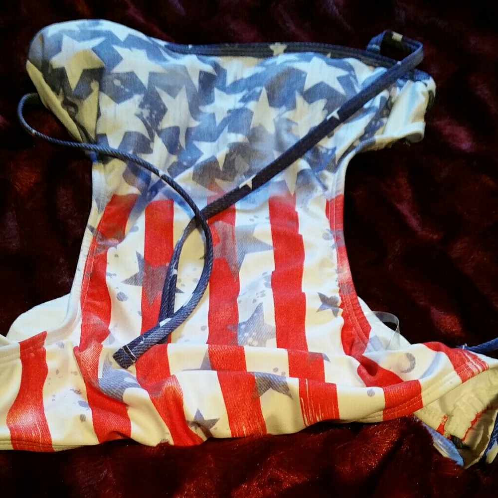 O.P. red, white & blue bathing suit. Size Medium.
