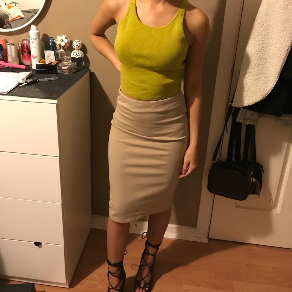 Green crop top and beige midi skirt