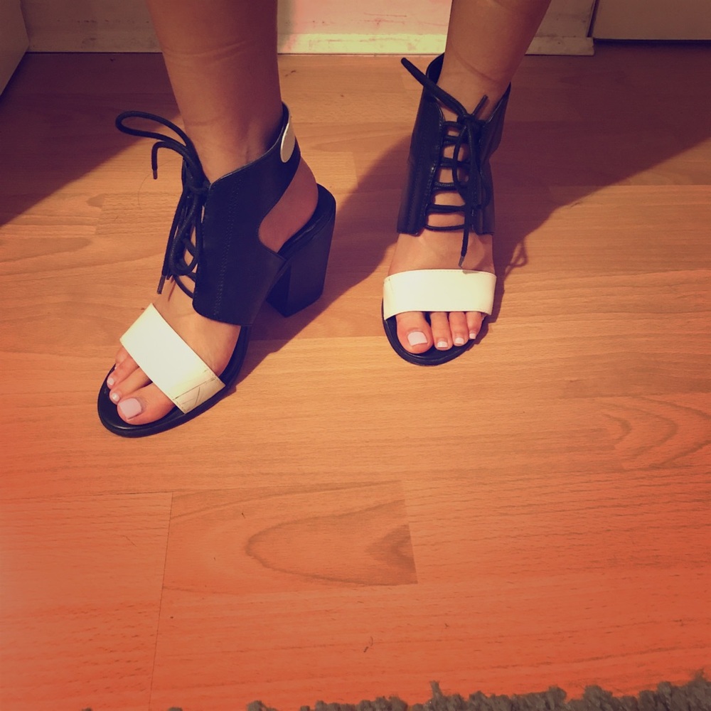 Black and white leather block heels