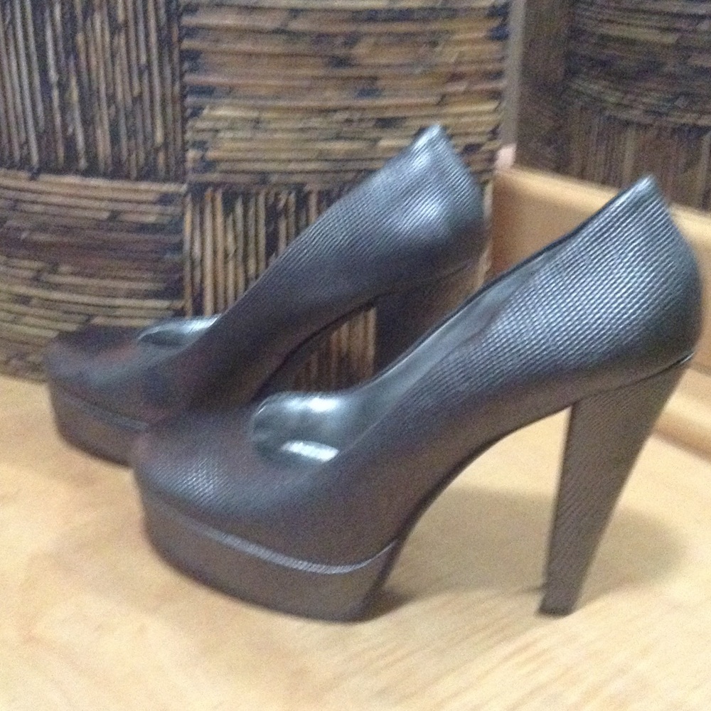 Barely used Calvin  Klein black silver heels