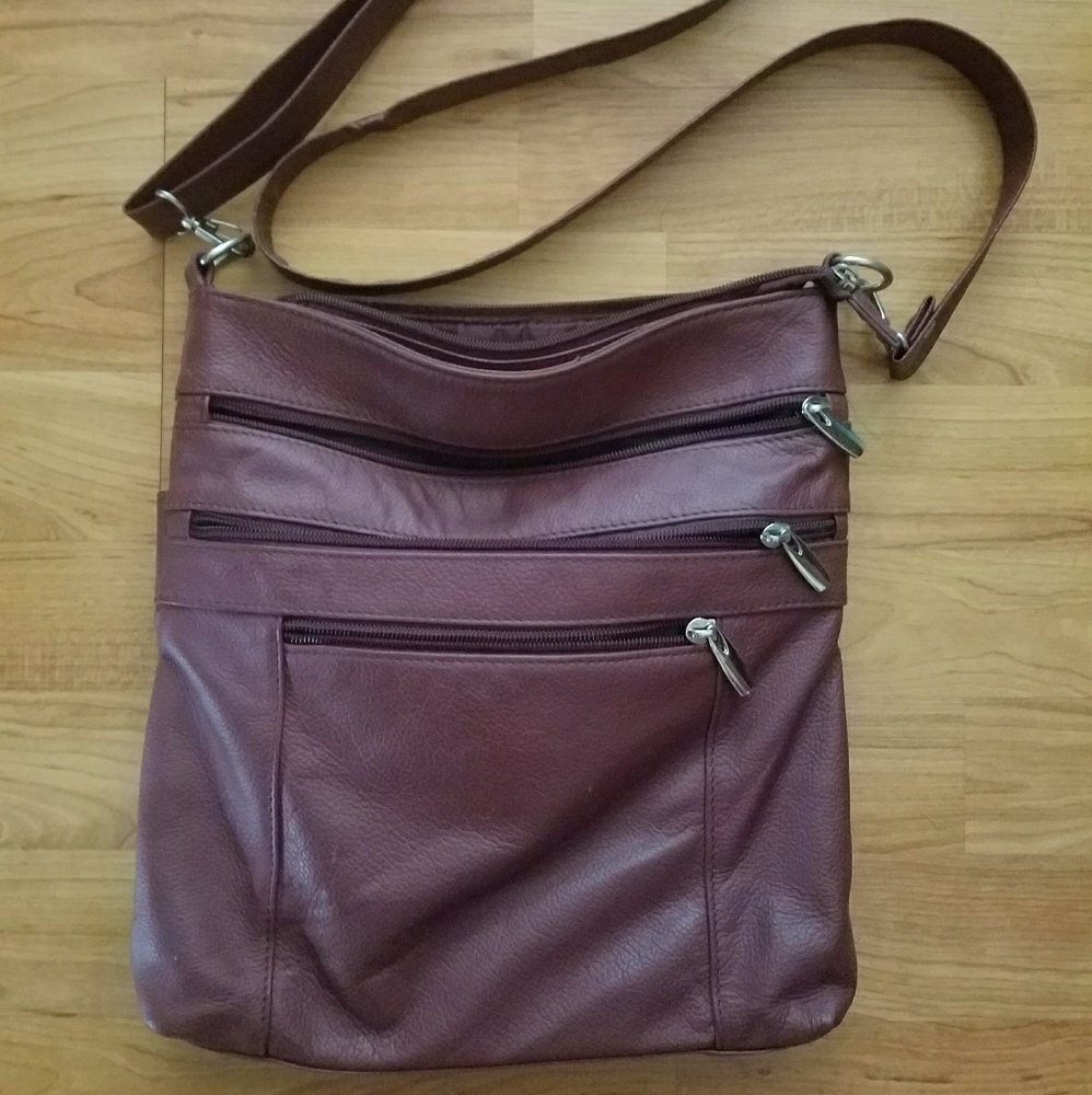 Leather bag with adjustable strap