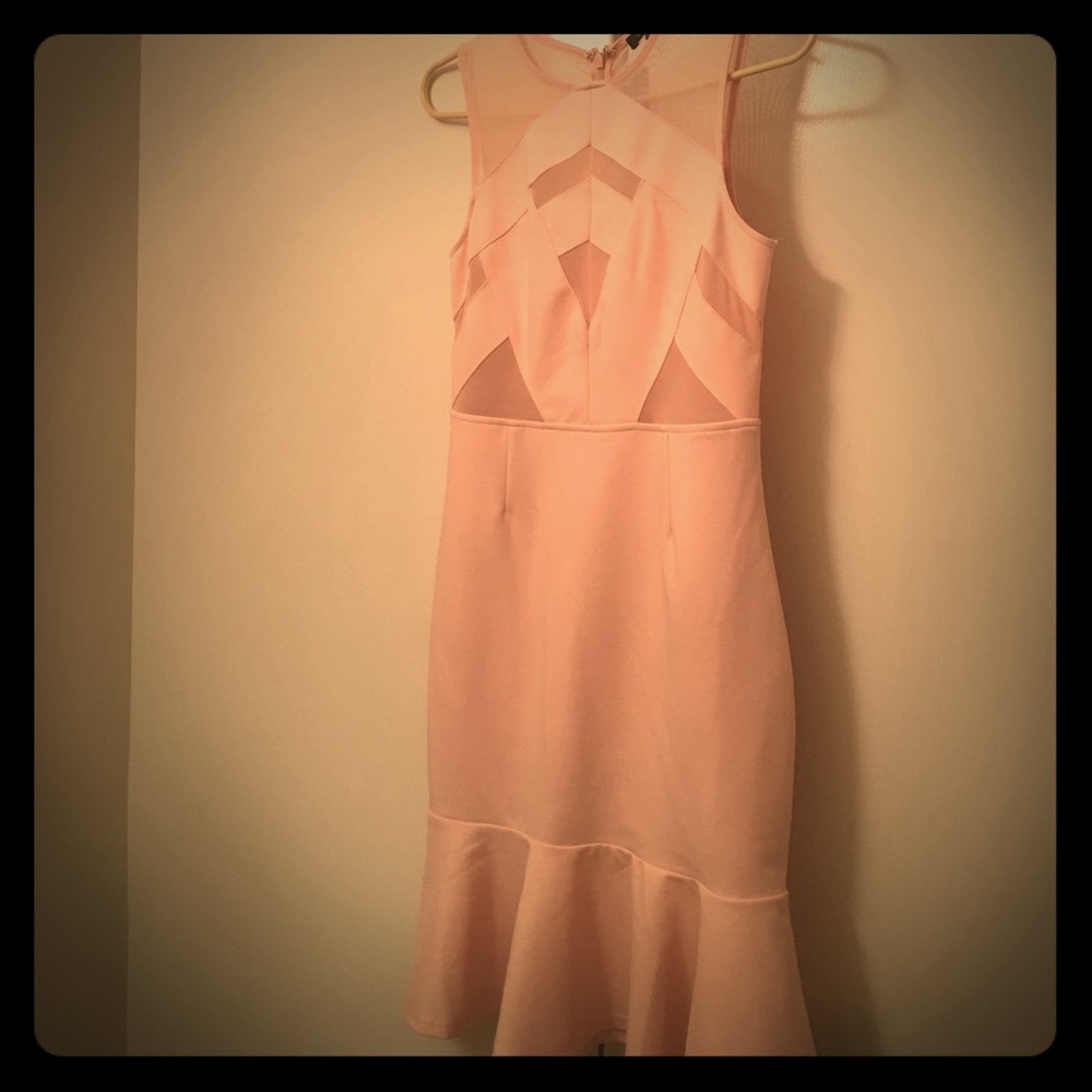 Pink sleeveless dress with sheer cutouts