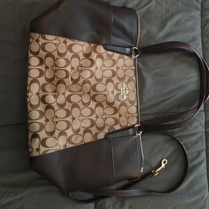 Coach Bag. Signature fabric and brown leather