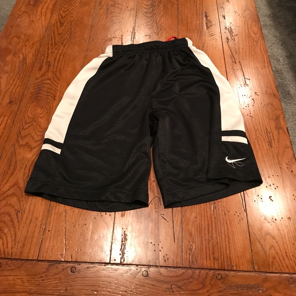 Boys black white and red Nike shorts