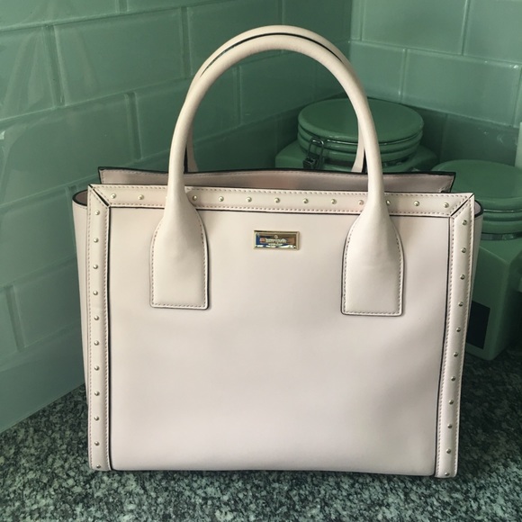 kate spade Handbags - Kate Spade blush grommet outline 100% leather bag