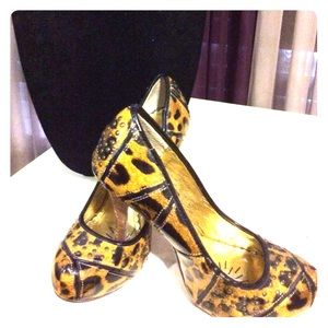 Mustard colored pumps with wooden heels!