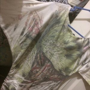 Quarter sleeve && hangs off the shoulder