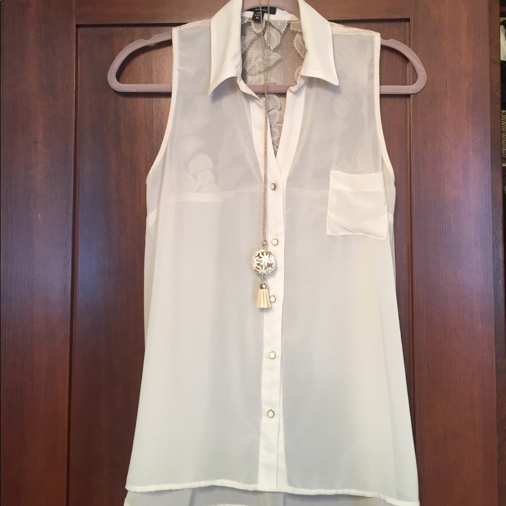 Sheer sleeveless blouse.