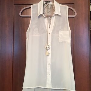 Sheer sleeveless blouse.