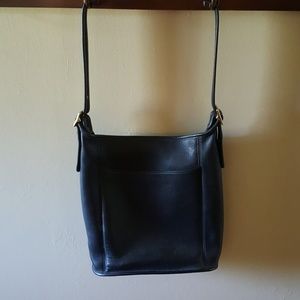 Coach all leather black purse.