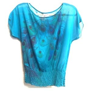 Teal peacock feather sheer blouse.