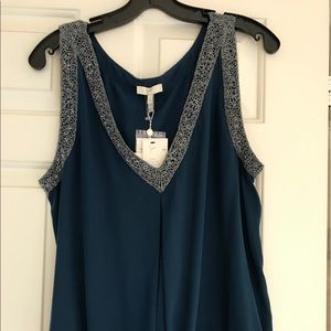 Dark teal vneck top with elastic band at waist