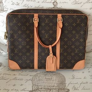 Louis Vuitton Briefcase....never used!