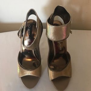 Guess by Marciano gold heels size 5
