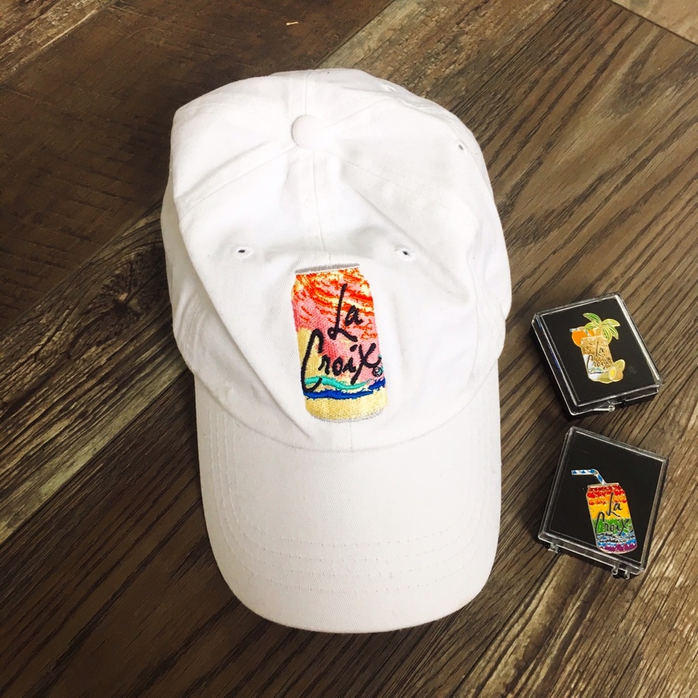 La Croix hat and pins