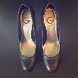 G by Guess black leather pumps.