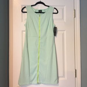 Dress with neon yellow zipper accent