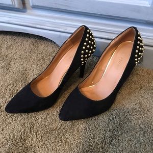 Studded black heels.