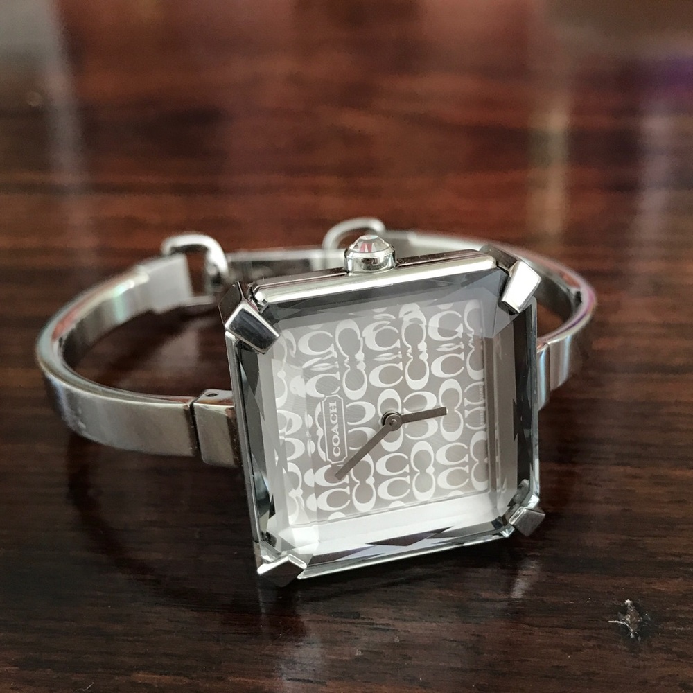 Coach stainless steel and water resistant watch