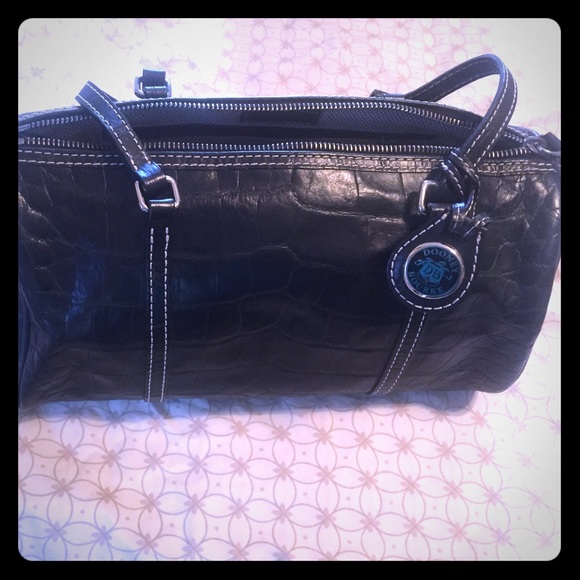 Black Dooney & Bourke cylindral handbag - Picture 1 of 4