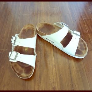 White Birkenstock Arizona sandals