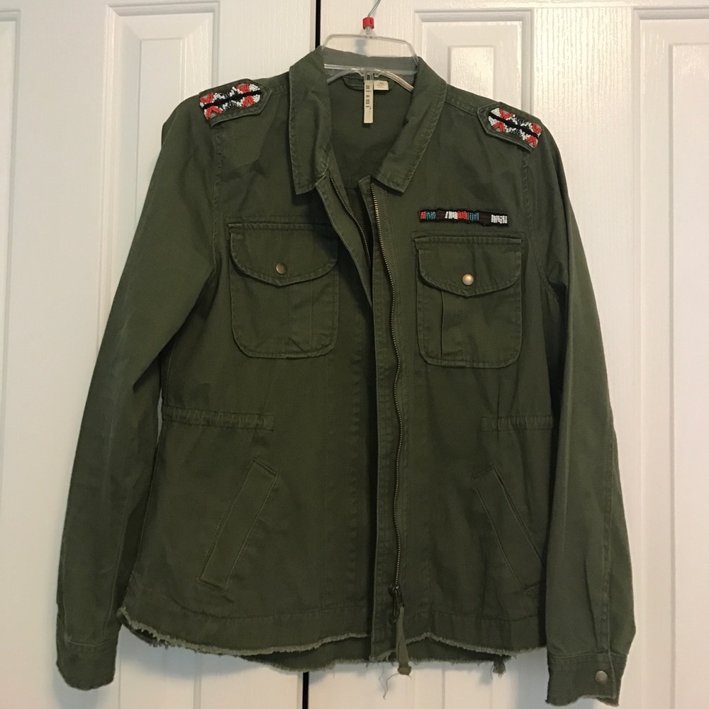 Green jacket with beaded details