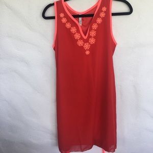 Coral dress with neon Detail and embroidery