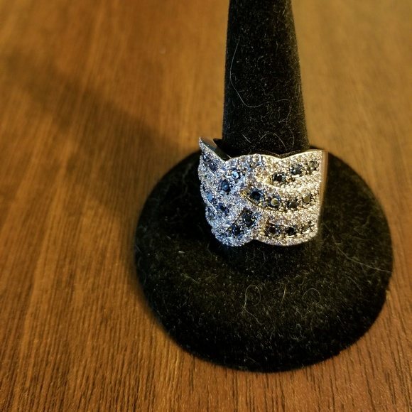 Noble Jewelry - Beautiful blue and white sapphire bypass ring