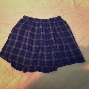 A black and grey flannel skirt