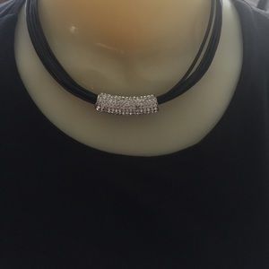 Black cord choker with silver design