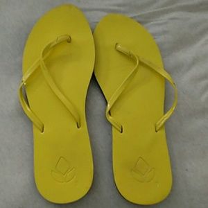 Reef Yellow flip flops