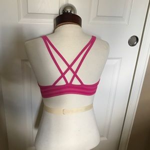 Tonic pink striped sports bra