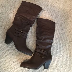 Chocolate brown heeled boots.