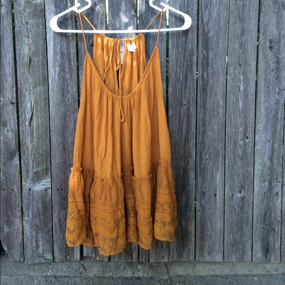 Mustard yellow swing tank