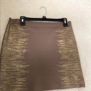 Guess skirt. Tan with Gold accents. XL